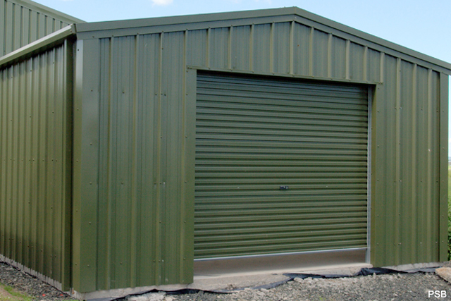 A close up of a large dark green building